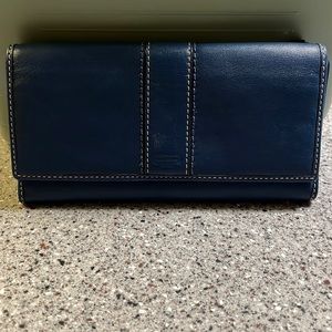 Coach navy wallet. Zippered pocket, 12 credit card slots and 3 bill compartments